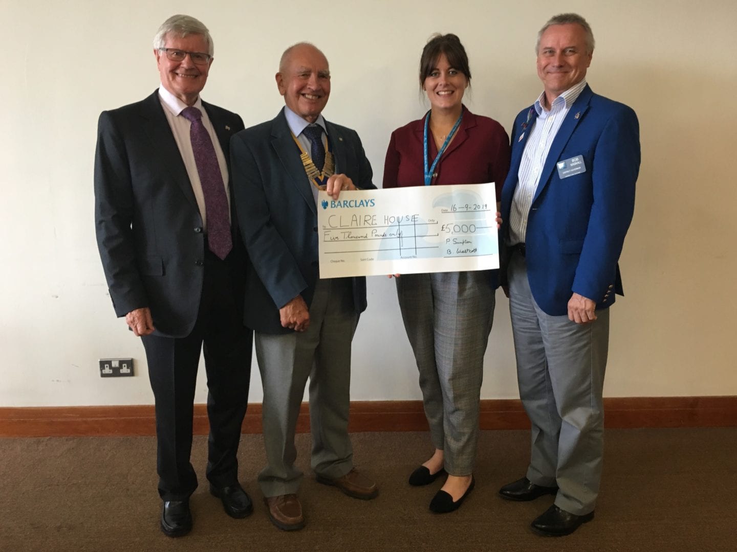 cheque presentation to claire house